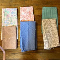 Six One Yard Pieces Of Fabric