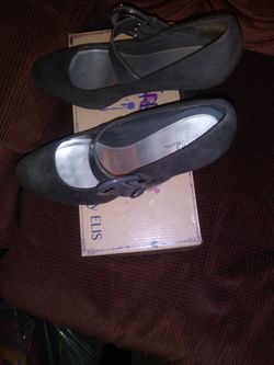 Two pair of Jaclyn Smith high heels , size 9.