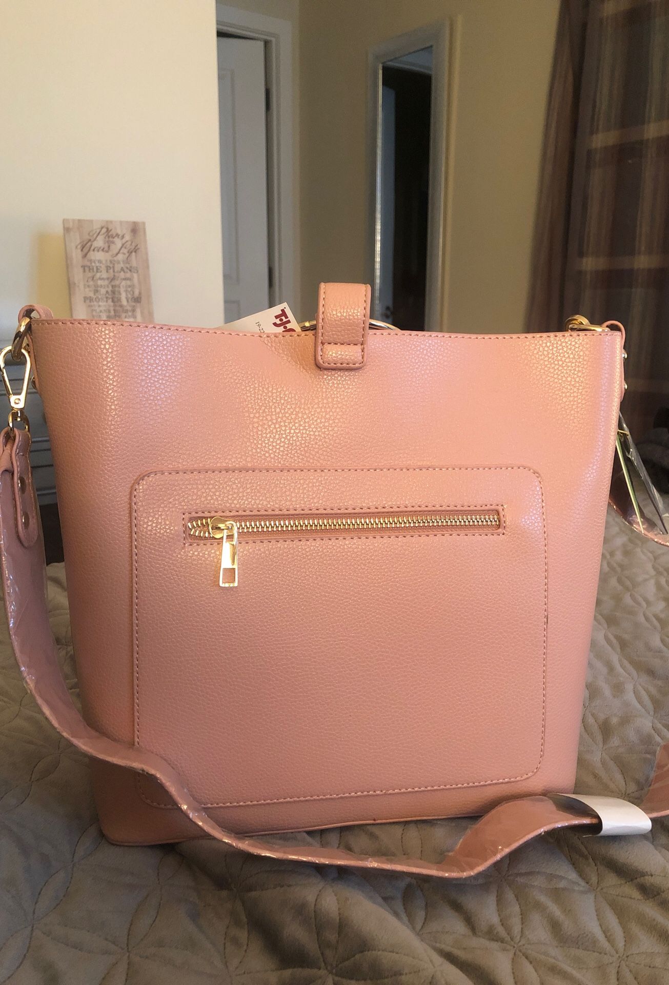 Light pastel pink women’s purse. Never worn.