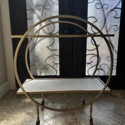 Gold and white metal rolling bar