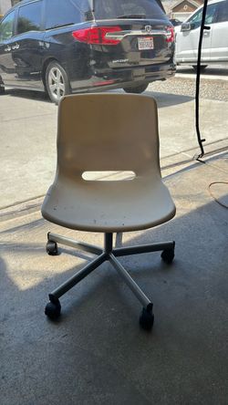 White Plastic Office Chair on Wheels
