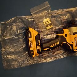 DeWalt atomic brushless 1/4 hex impact with battery.