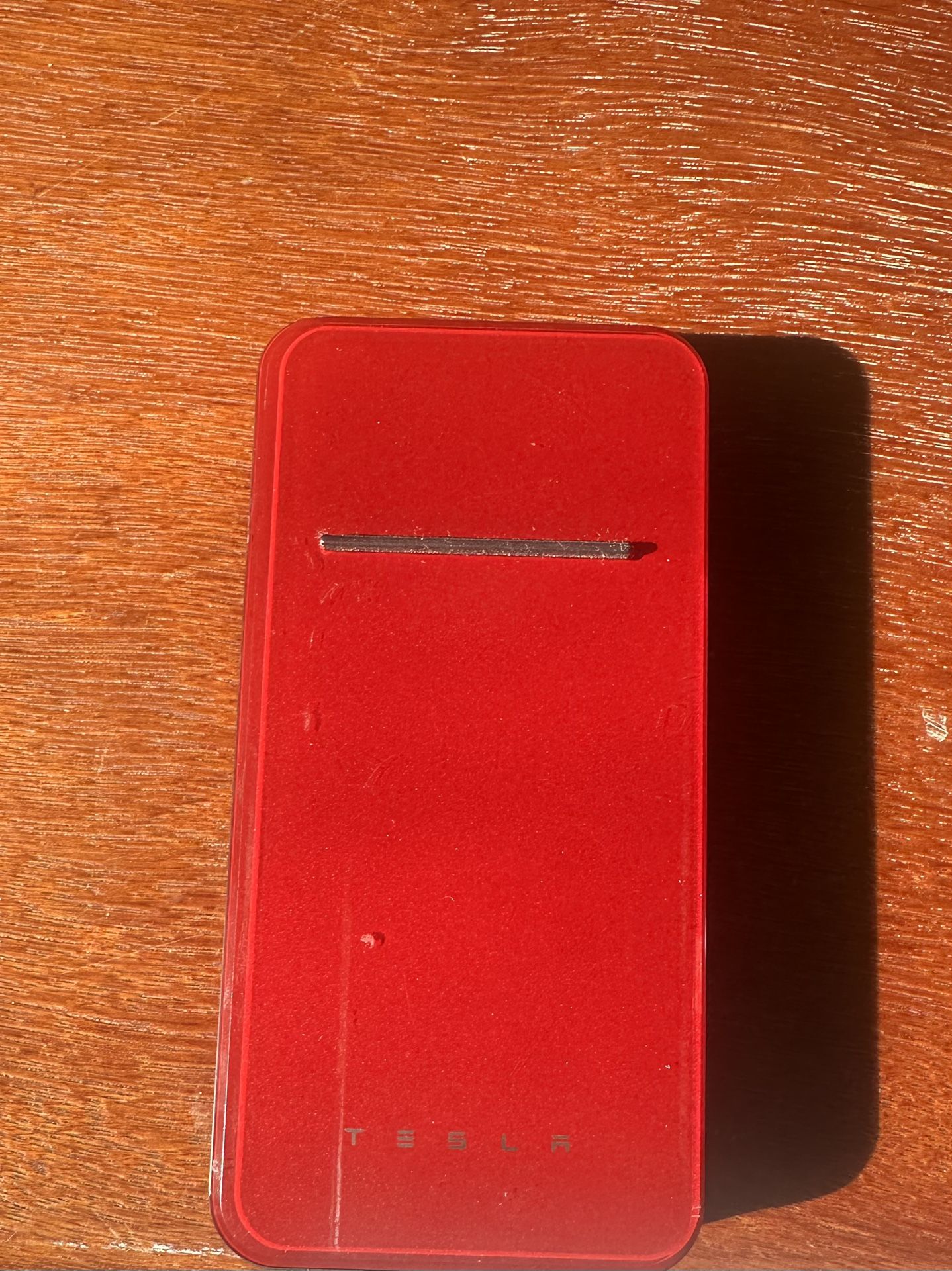 Original Tesla wireless portable charger. 2.0 RED MULTI-COAT ( CHARGING CABLE INCLUDED )
