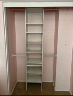 White Closet Organizer with Shelves and Hanging Rods