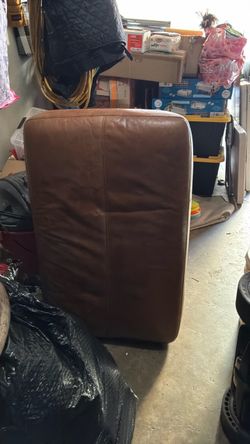 Real leather couch will be cleaned if bought