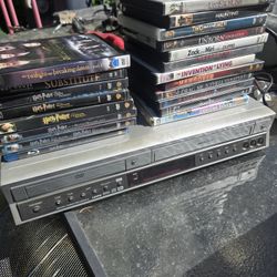 dvd/vhs  player with 19 dvds
