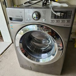 LG Front Loader Washer $100.00 + Ironman Inversion Table Holds Upto 200lbs Person $20
