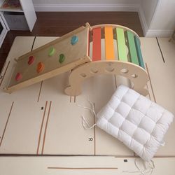 Wooden toddler climbing/rocking arc set with reversible slide and rock wall and cushion, rainbow color
