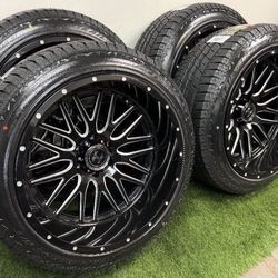 NEW 22x12 gloss black/milled wheels and atturo 285/45r22 tires