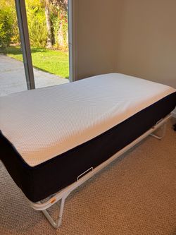 Single Mattress on Folding Metal Bed Frame