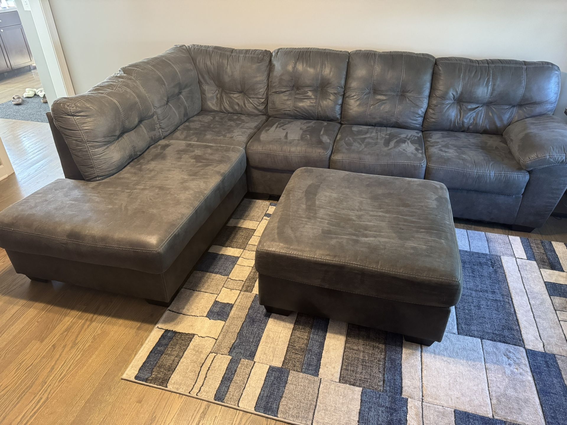 Grey Sectional With Chaise And Ottoman