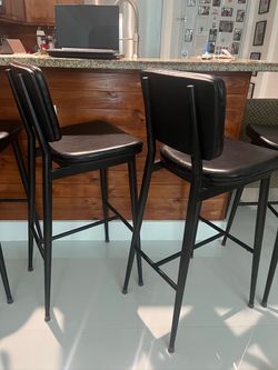 Brown Metal Bar Stools with Cushioned Seats