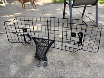 Car barrier for dogs