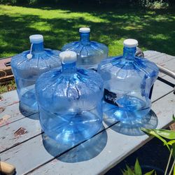 FOUR 3 Gal water bottles