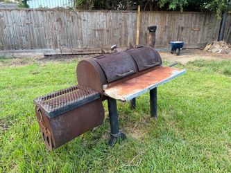 Heavy gauge metal smoker on wheels