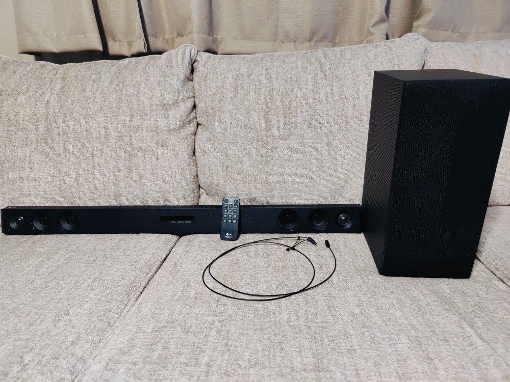 LG Soundbar With Subwoofer & Remote