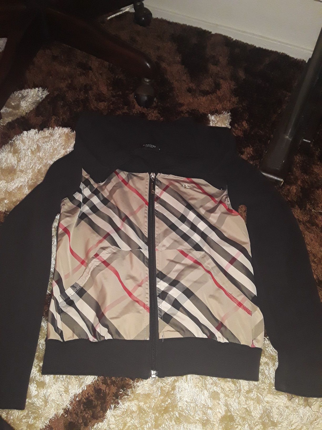 Authentic women's Burberry sweater size S/M