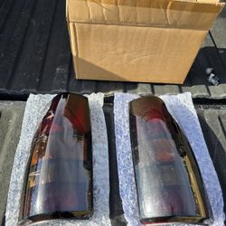 99-2005 GMC Sierra Smoked Taillights 