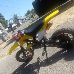 Yellow 50cc Dirt bike Used a Couple Times Just Got A Upgarde