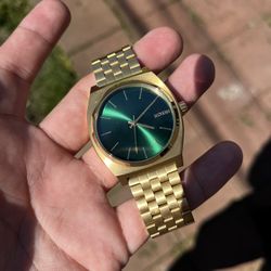 Nixon watch store gold green