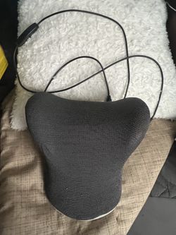 Heated neck stretcher