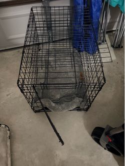 Dog Crate, bed, bowl stand, new toys and food. $25 OBO