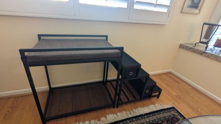 Dog bed with stairs for the window view.