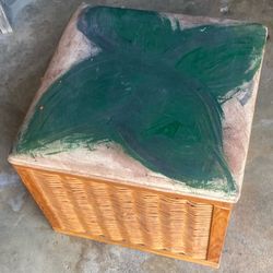 is wicker storage trunk/ottoman with top cushion