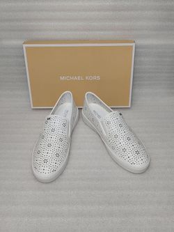 Michael Kors Designer women's sneakers Slip ons flats. New In Box. White. Authentic. Size 9 women's shoes. Super comfy