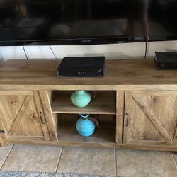 TV Stand is 58" width & 25" height
