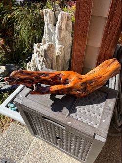 Hand-carved decorative sculpture made from natural wood 23”