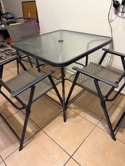 Outside table with four chair