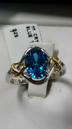Genuine .925 sterling silver two tone blue topaz size 7.5