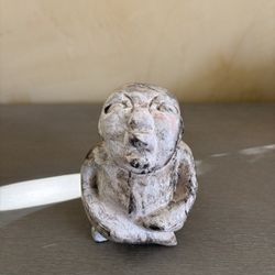 hand-carved terracotta clay figurine