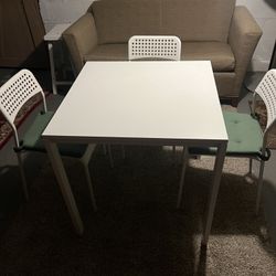 Table And 3 Chairs