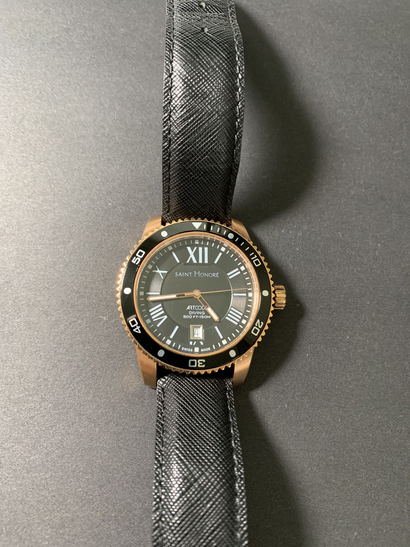 A Beautiful Black And Gold Mens Watch