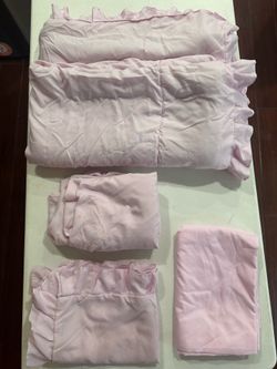 Pink ruffled bedding set