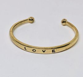 Gold plated cuff bracelet with engraved LOVE