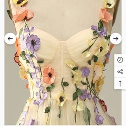 NEW!! Size 2 champagne-colored prom gown featuring delicate spaghetti straps and 3D floral appliques