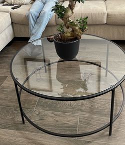 Black metal frame with black glass top coffee table