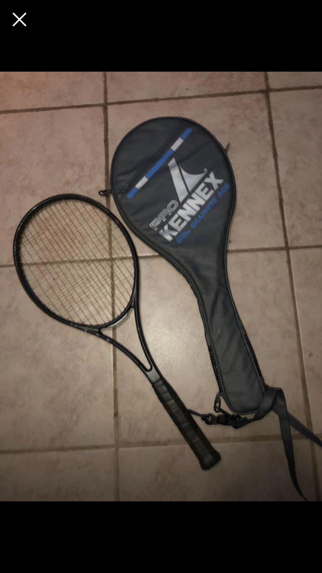 Tennis racket with pouch