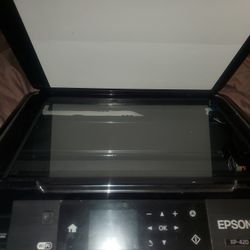 Epson XP420 all in one printer, copier, and fax that goes for over $200 and im selling for only $20 . works great