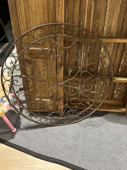 DECORATIVE WALL ART,  29" diameter; cross streets are Arapaho & Waterview 