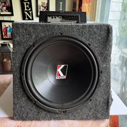 15"Kicker Old school Sub in sealed box and Rockford 400w amp