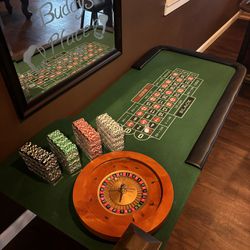 Roulette Table With Wheel And Chips.