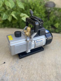 Selling A Two Stage Globe saver Vacuum pump  In good condition