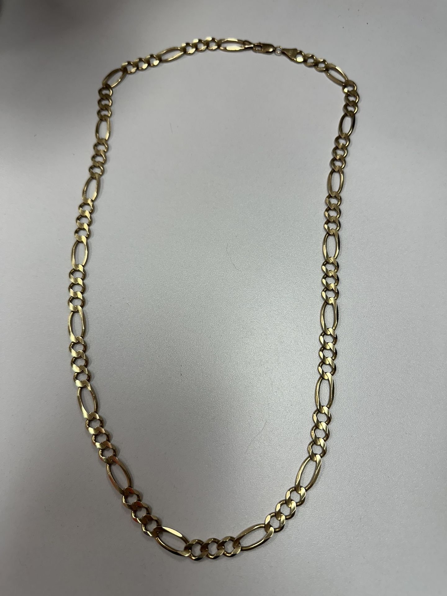 10k solid gold Figaro chain 8MM.  26” 38.65 grams 