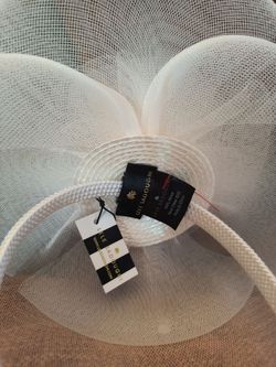 Brand new-  Lele Sadoughi white bridal fascinator hat, often used for weddings or formal events