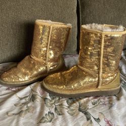 Ugg Australian sheep skin boots, gold sequence, size 5