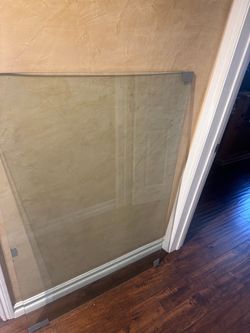Free coffee table glass aprox dimensions 52x35 the corner has a dent and covered with tape